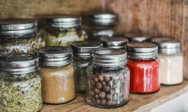 Spice Bottles On Shelf